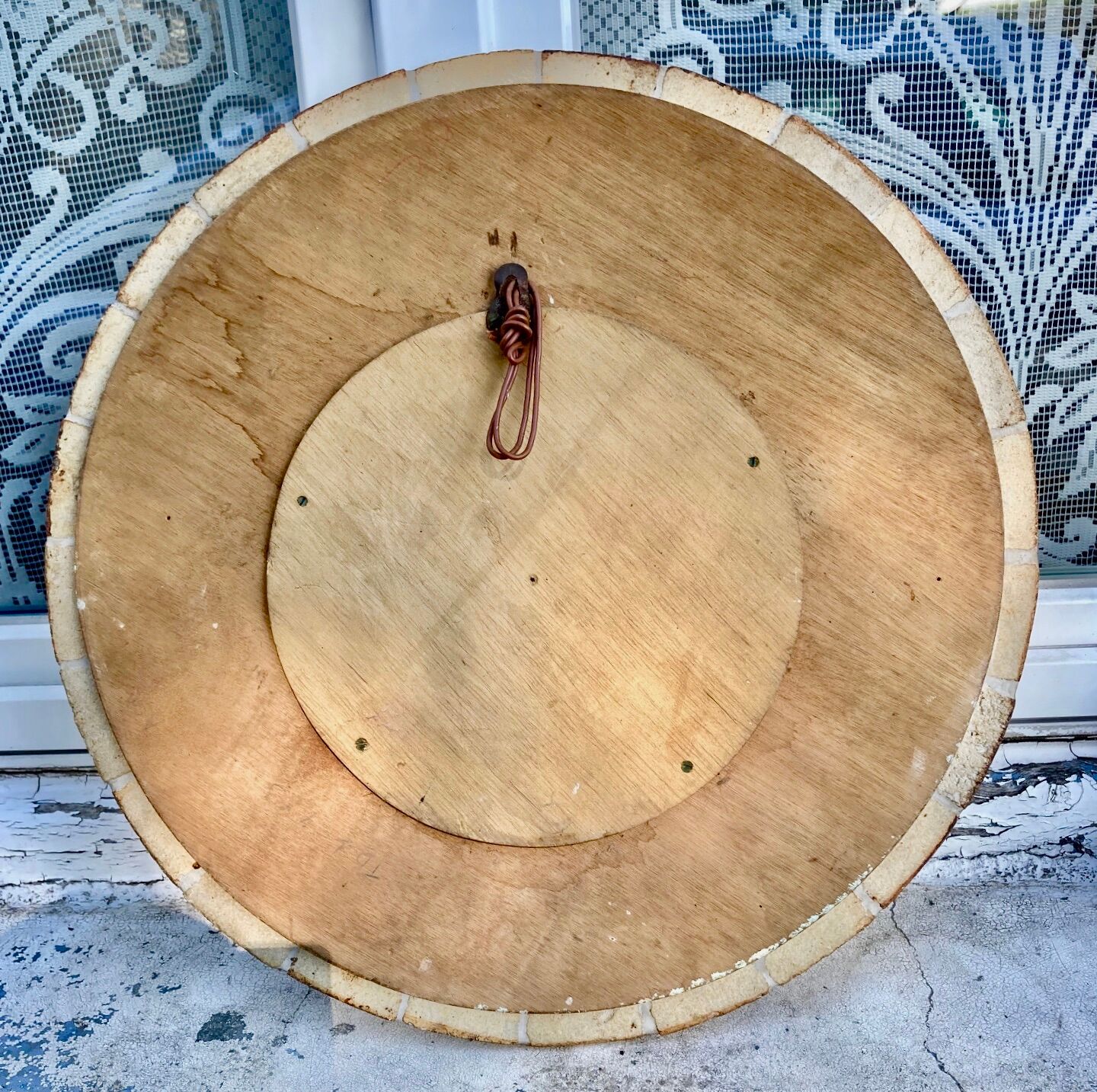 Round ceramic mirror decorated with leaves, signed Roger Capron, 50
