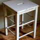 Workshop stool in vintage patinated solid wood