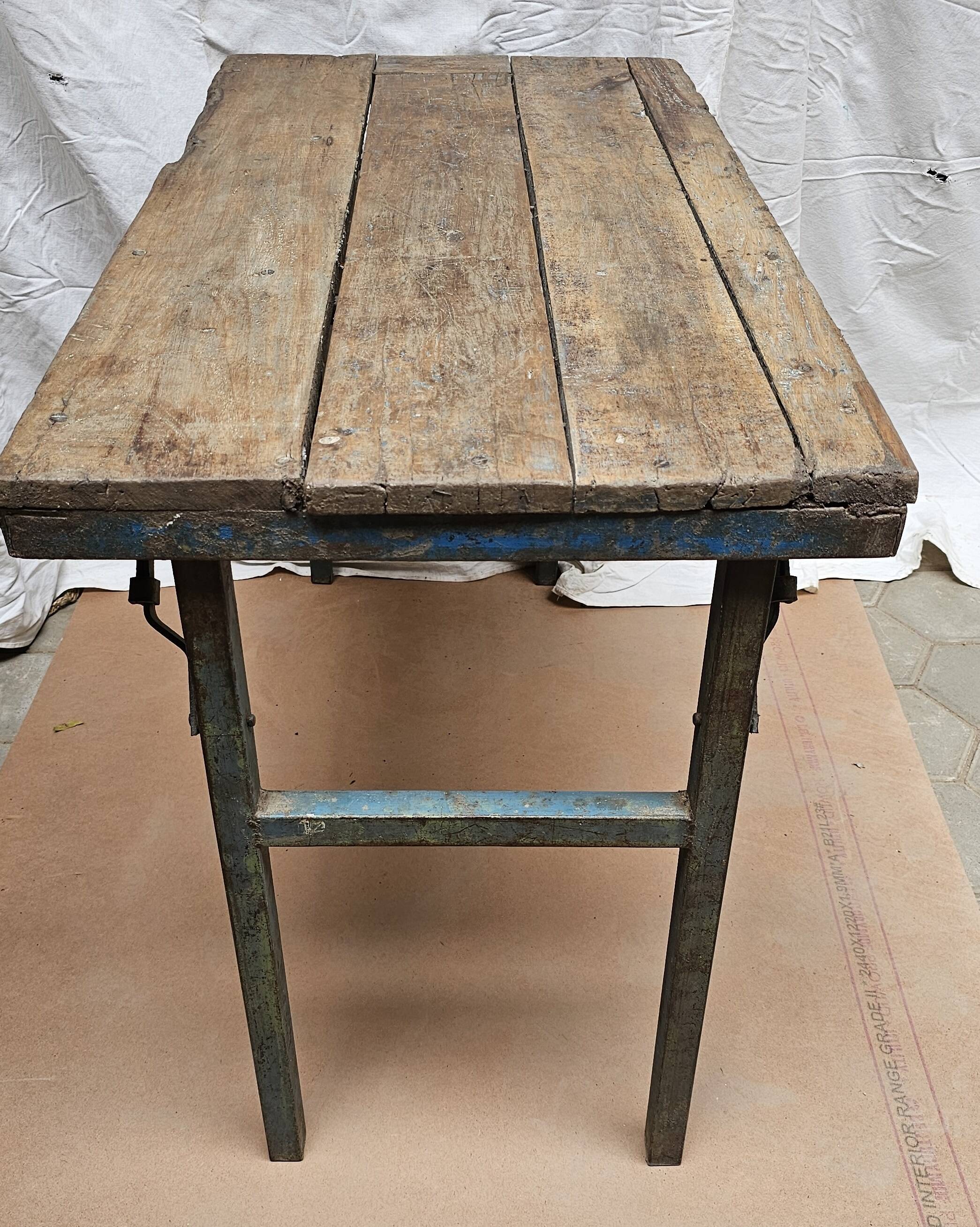 Folding workshop table in teak and wrought iron