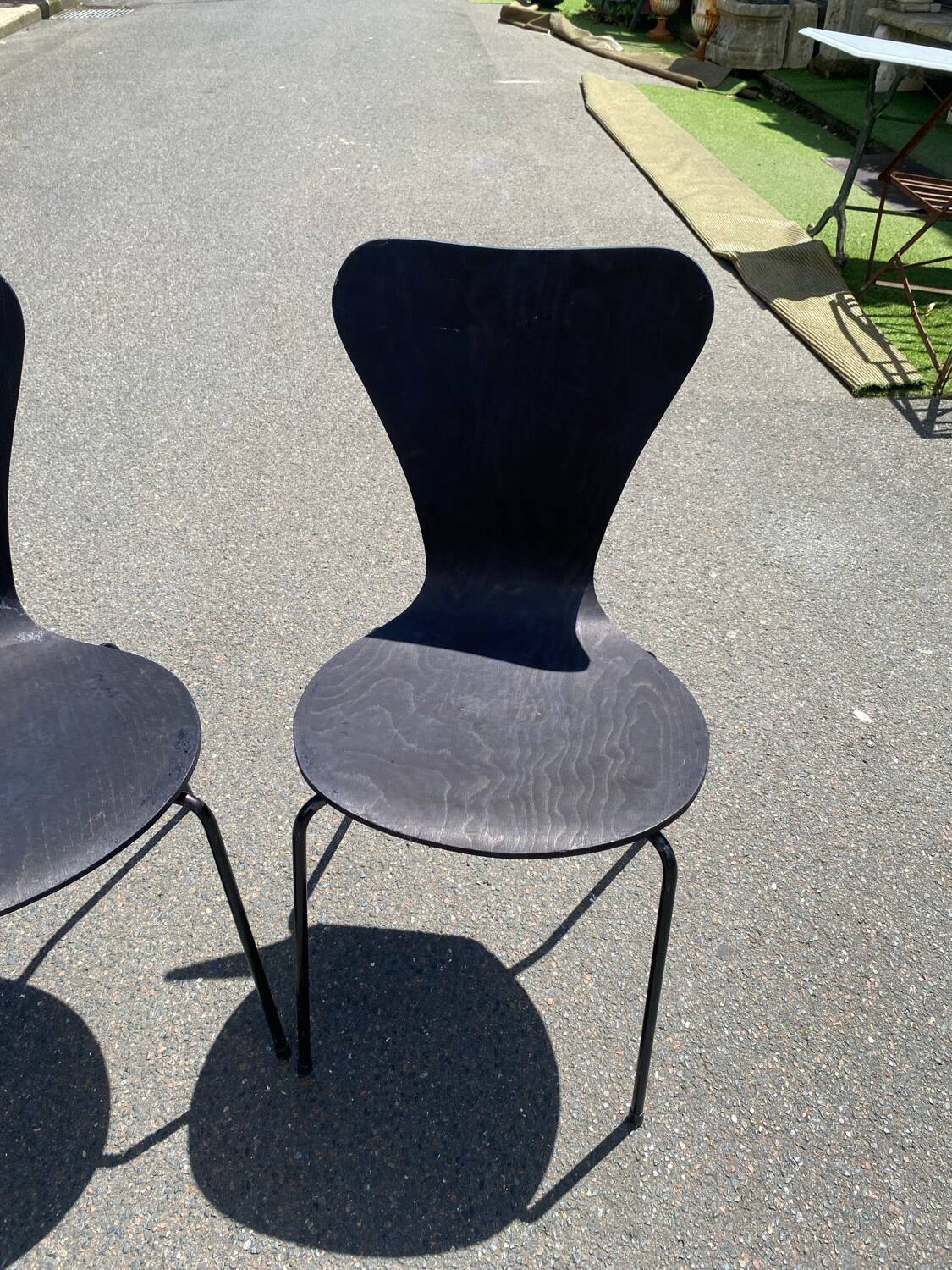 Pairs of wooden chairs