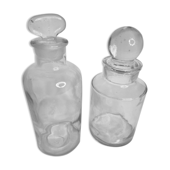 Set of two pharmacy bottles with their caps