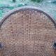 Paire de fauteuils en bois et rotin 1980