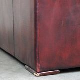 Beautiful red cowhide sleekly designed Chesterfield 2-seater sofa