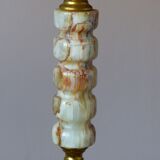 Lamppost in veined onyx and brass metal of the 1960s