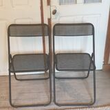 Pair of folding chairs in perforated metal