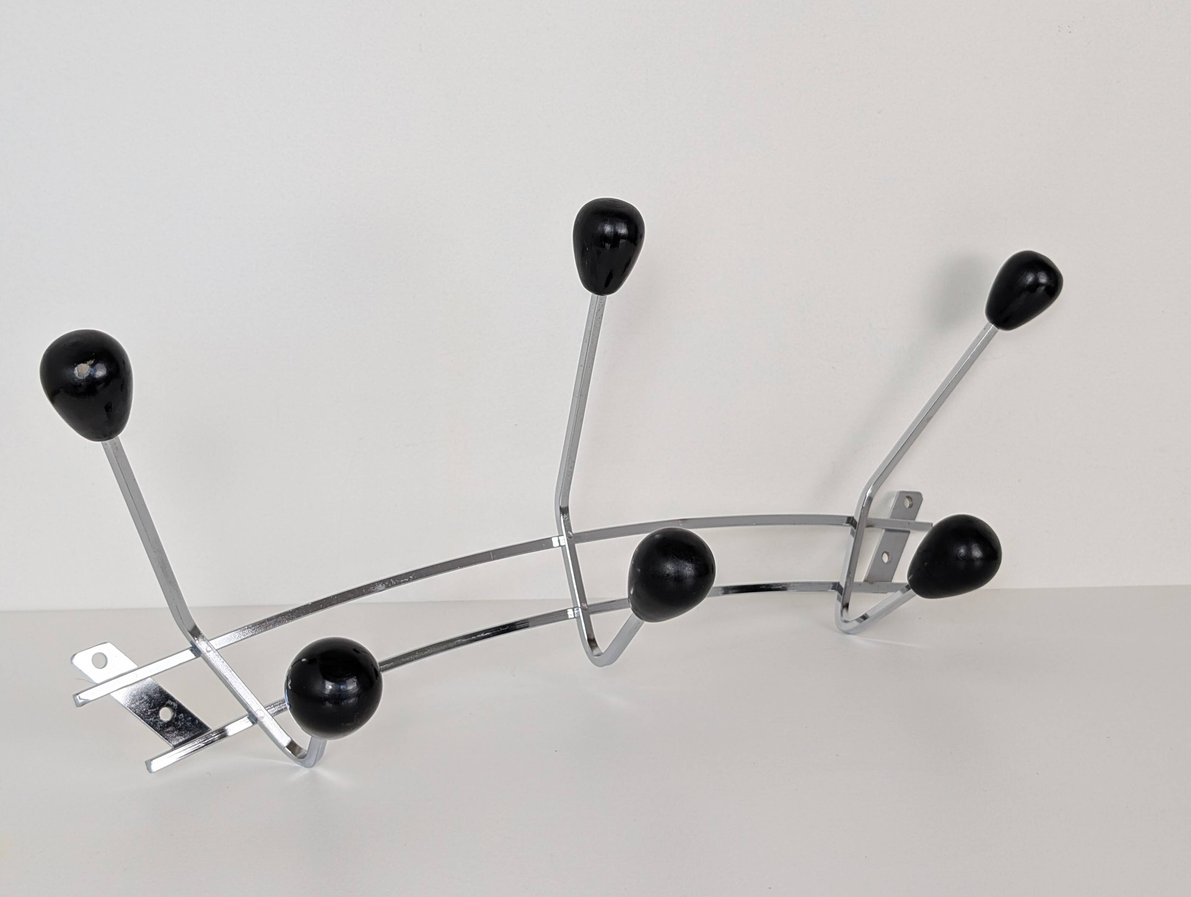 Chrome wall-mounted coat rack