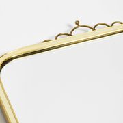 Large heavy long Mid Century brass wall mirror by Münchner Zierspiegel