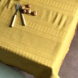 Old damask tablecloth tinted curry yellow