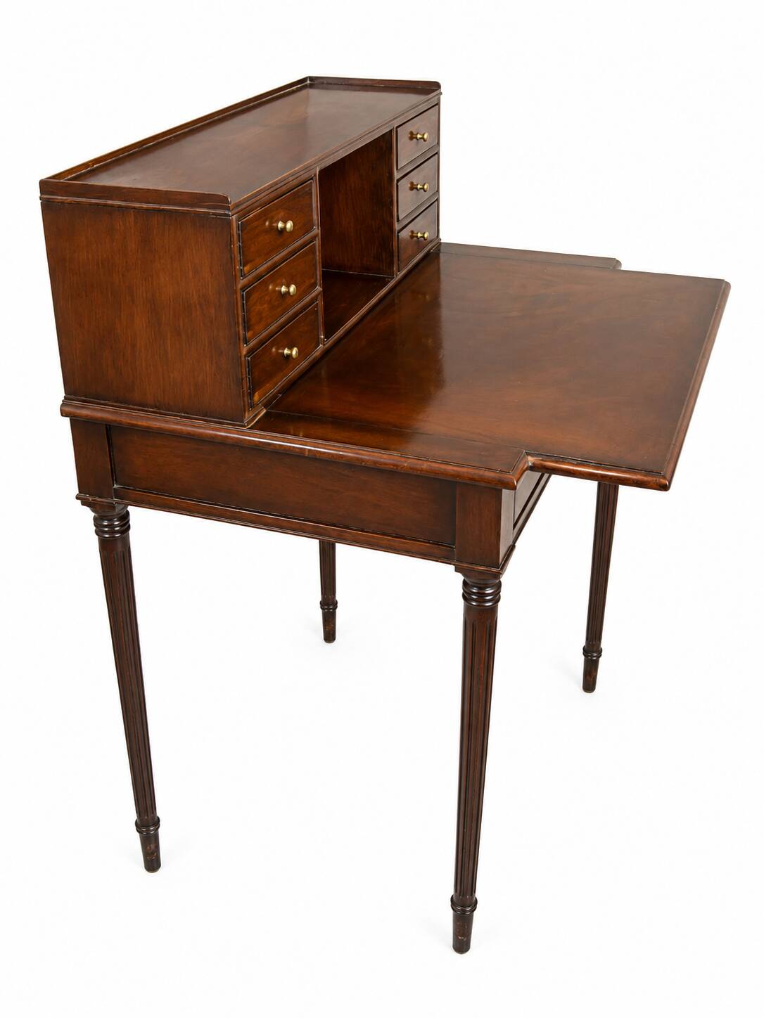 Antique mahogany step desk with a sliding shelf, ideal for small spaces.