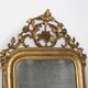 Louis-Philippe mirror from the 19th century with foliage and grape cluster motifs.