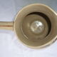 Antique pitcher decorated with flowers