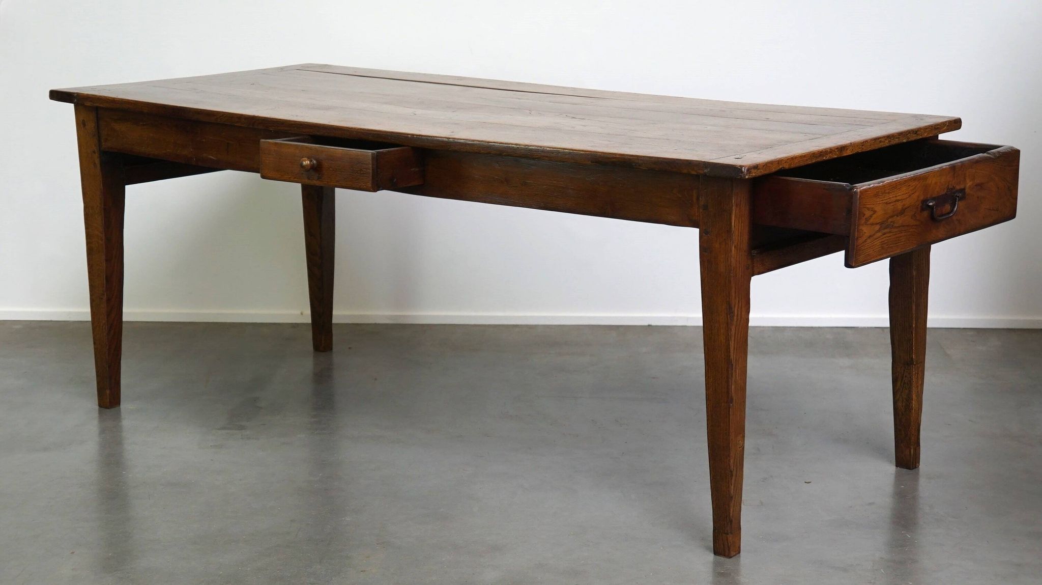 antique French oak dining table with 3 drawers and an exquisite patina