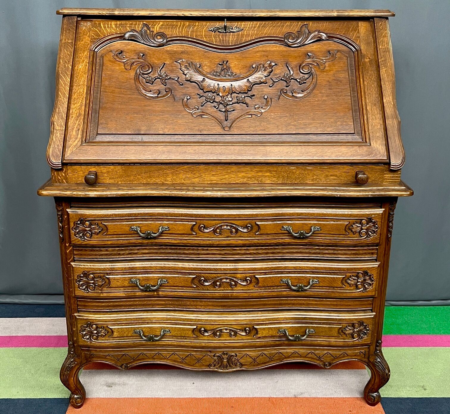 Liège secretary in carved oak in Regency style.