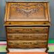 Liège secretary in carved oak in Regency style.
