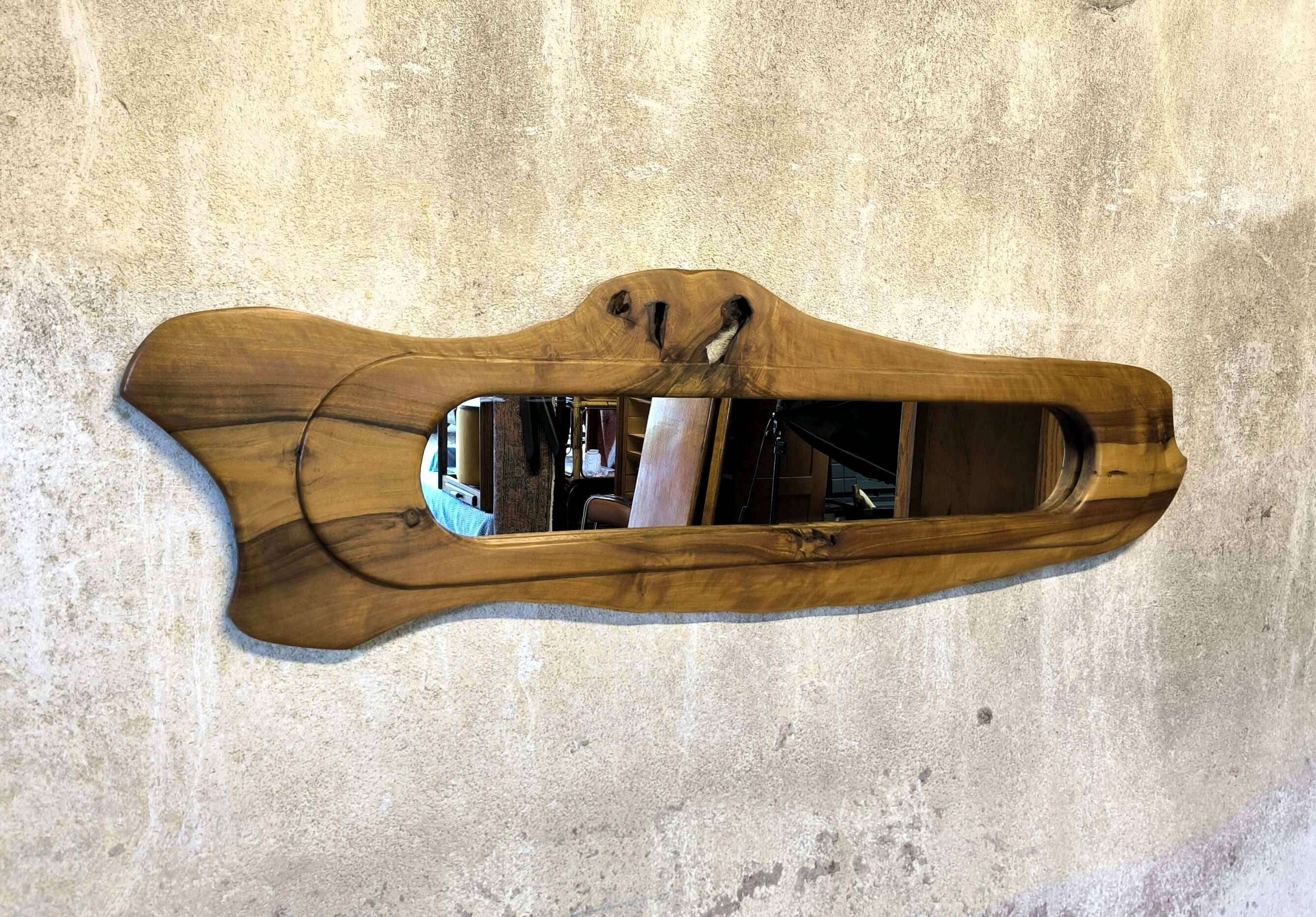 Vintage free-form mirror in solid wood.