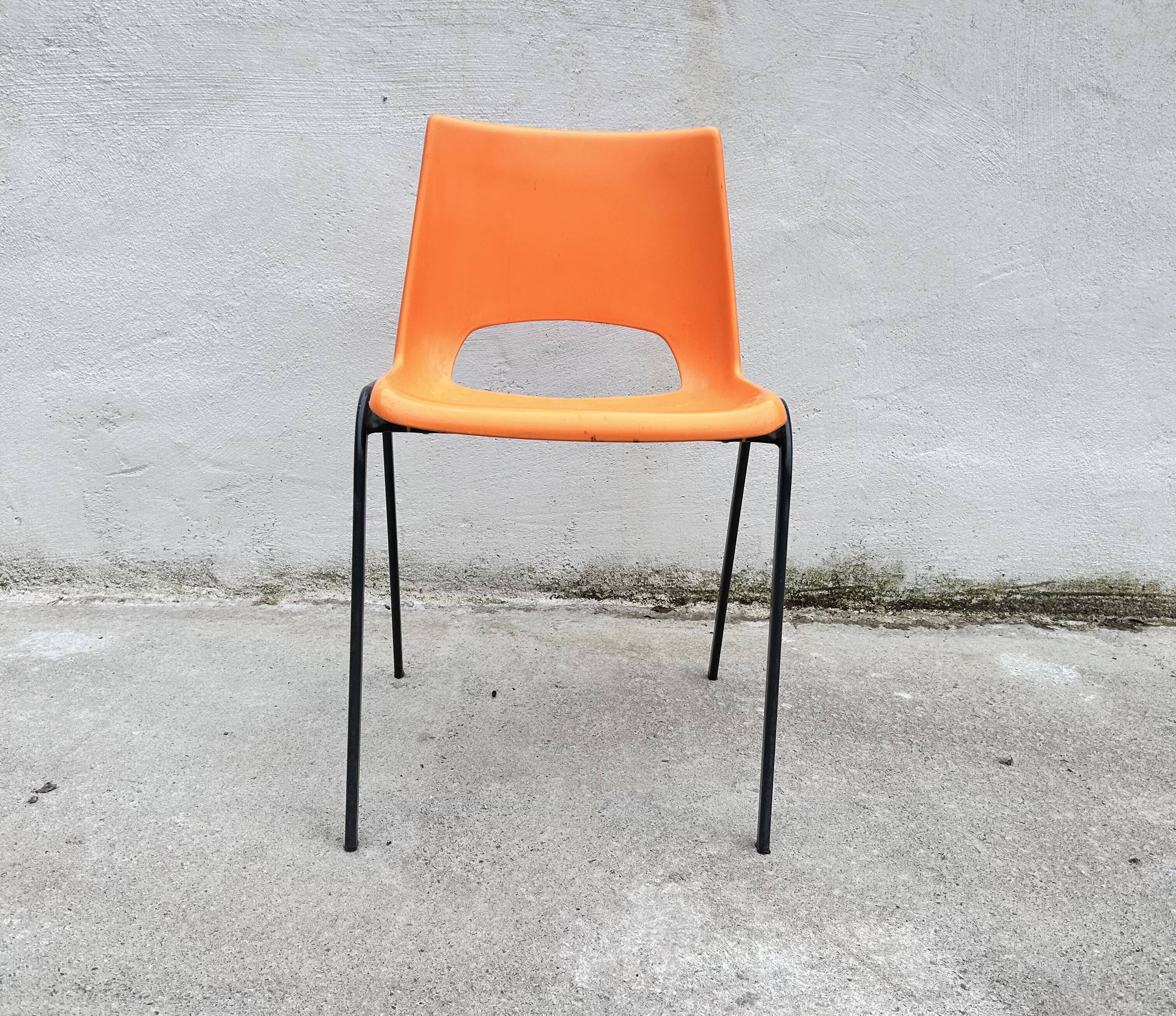Orange plastic shell chair