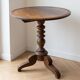 Antique wooden guéridon with a tilting top.