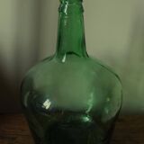 Dame Jeanne carboy from the Viresa collection in dark green glass