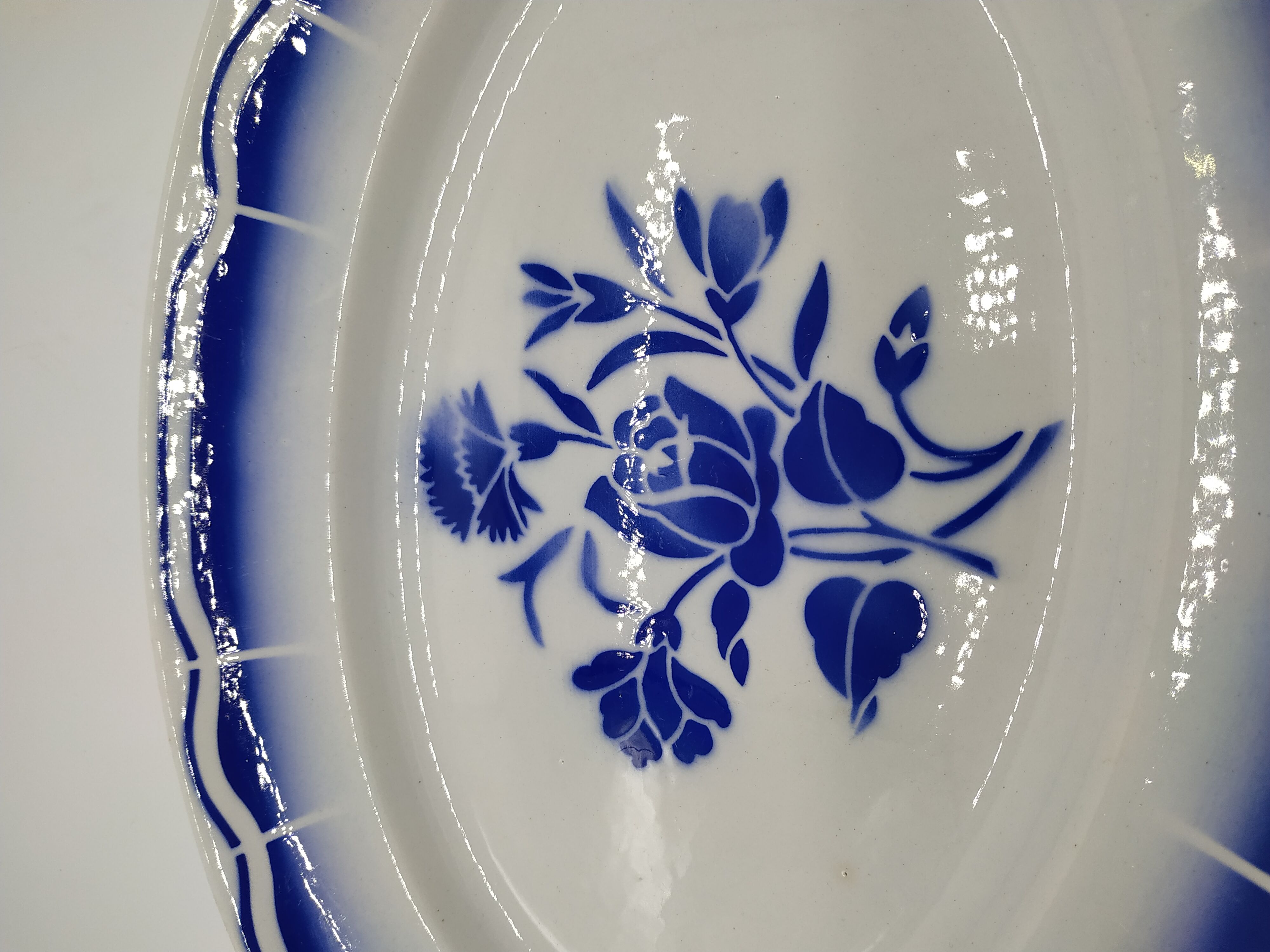 Vintage oval dish decorated with blue bouquet