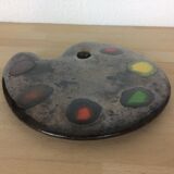 Under flat painter palette, ceramics