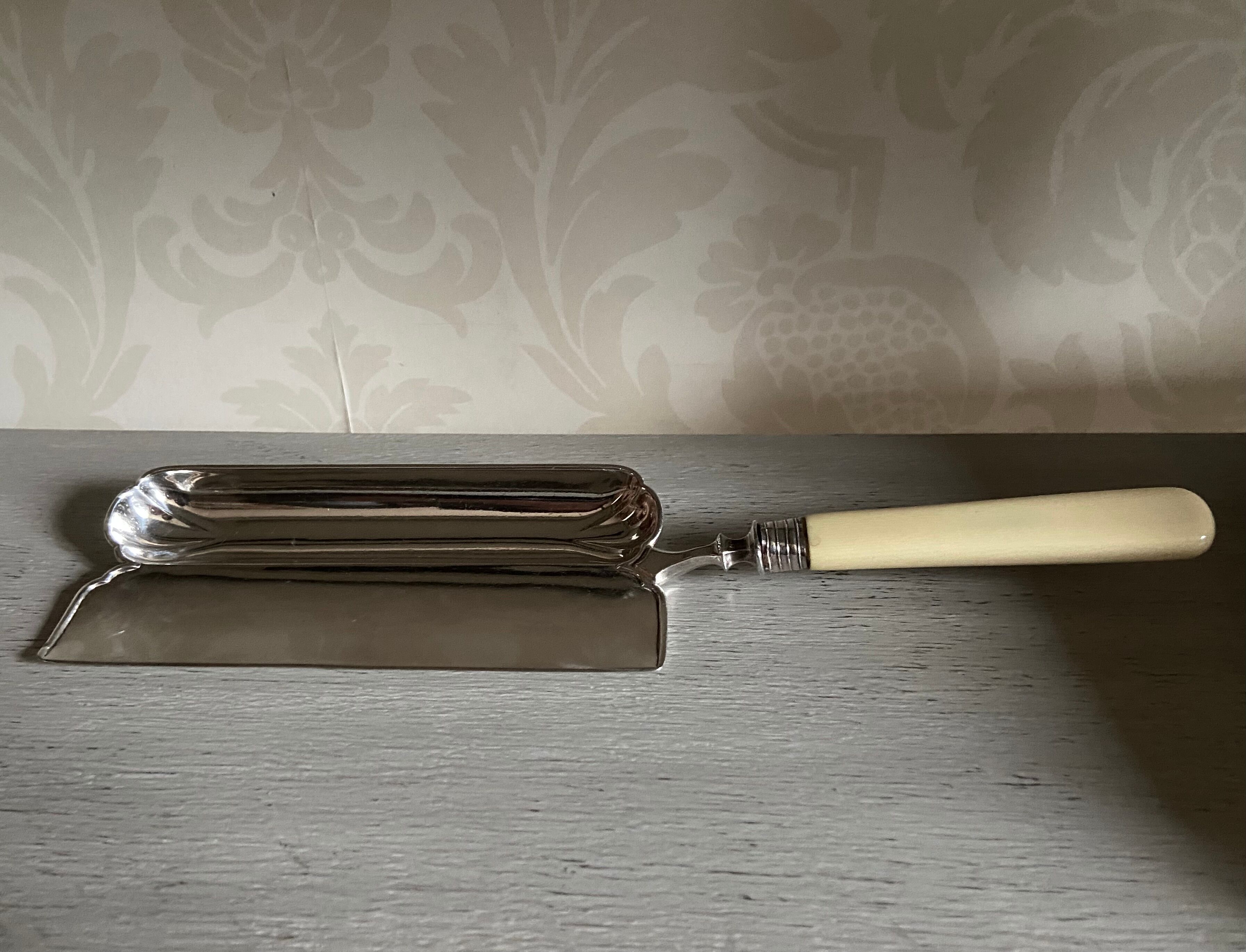 Old silver metal crumb tray