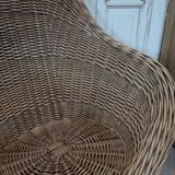Large woven rattan armchair
