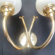 Pair of vintage wall sconces in gilded brass and pink opaline glass.