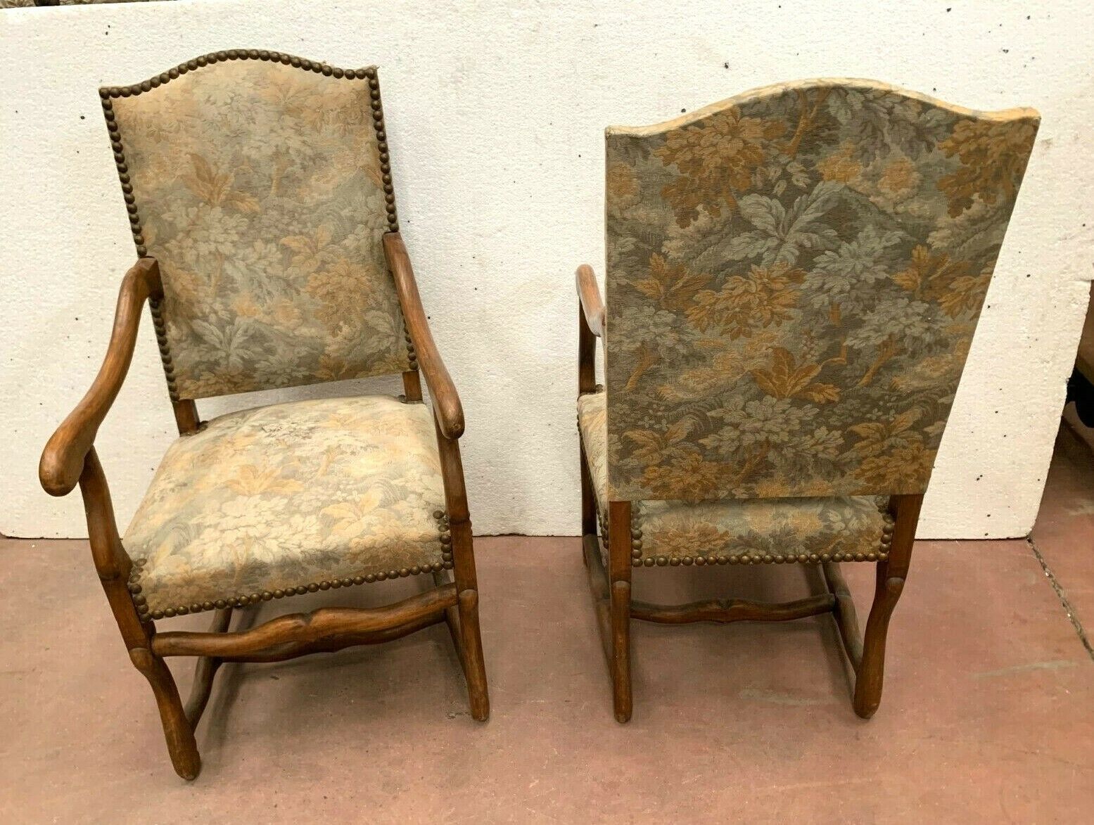 Pair of renaissance style armchairs in tinted beech XX century