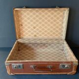 Old travel suitcase and legendary stickers, 1920