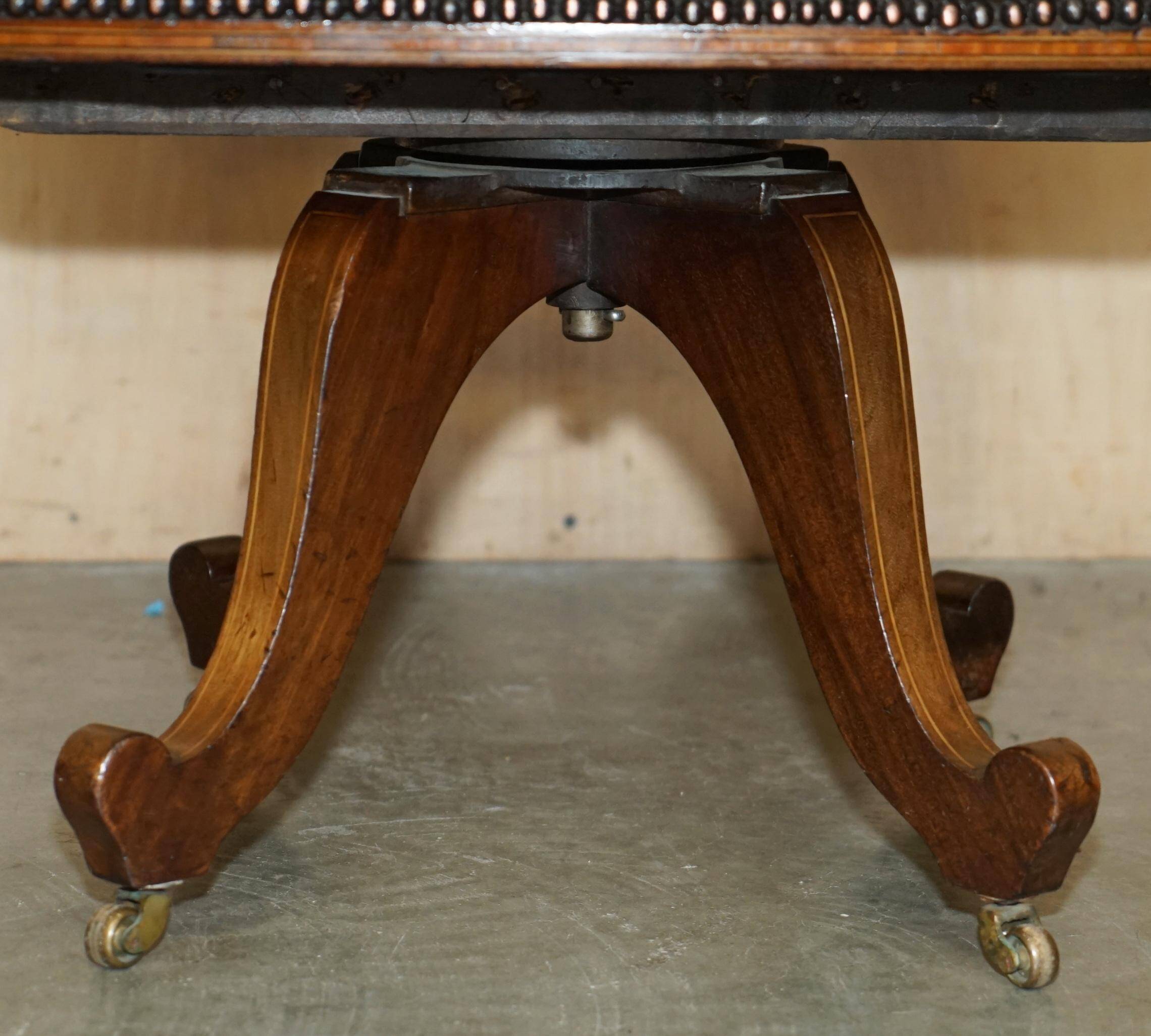 Victorian captain's chair in leather restored by Cornelius V Smith.
