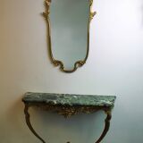 Bronze wall console and mirror.