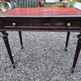 Bureau plat en acajou du XXe