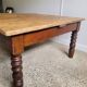Wooden coffee table with turned legs
