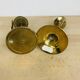 Pair of mother-of-pearl brass candlesticks with moon and sun