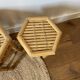 Set of three vintage rattan side tables.