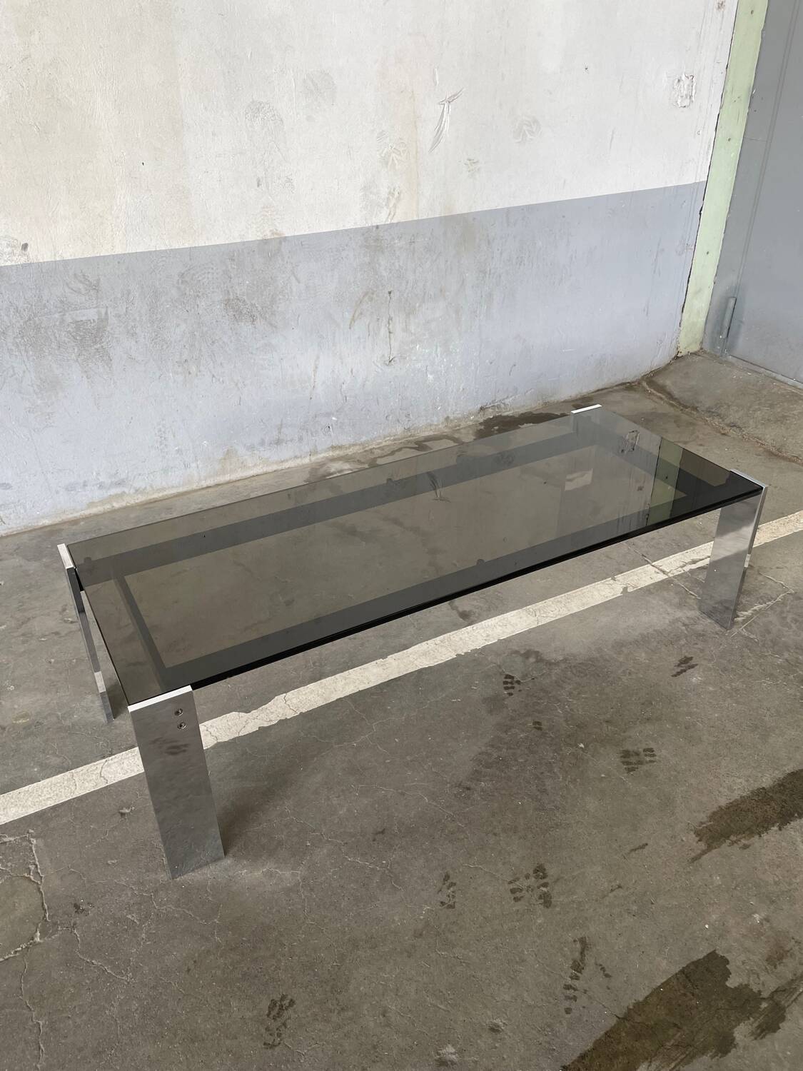 Chrome-plated steel coffee table with tempered smoked glass top