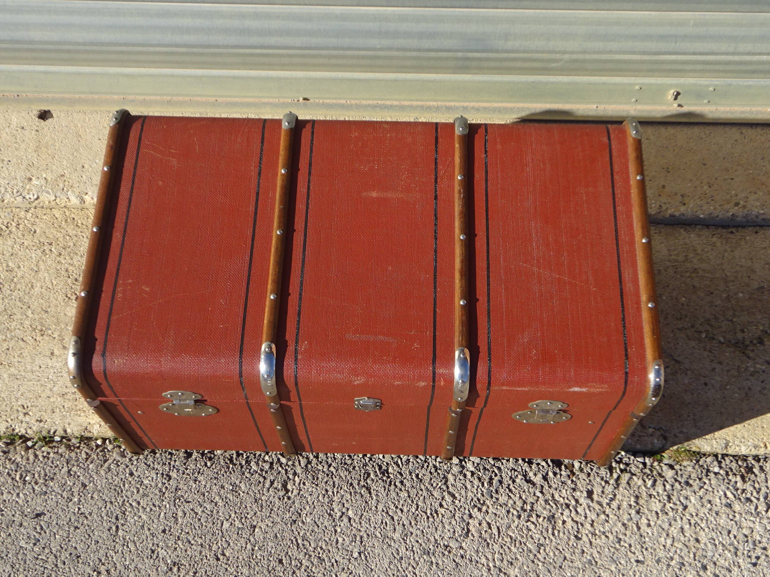 Old curved travel trunk