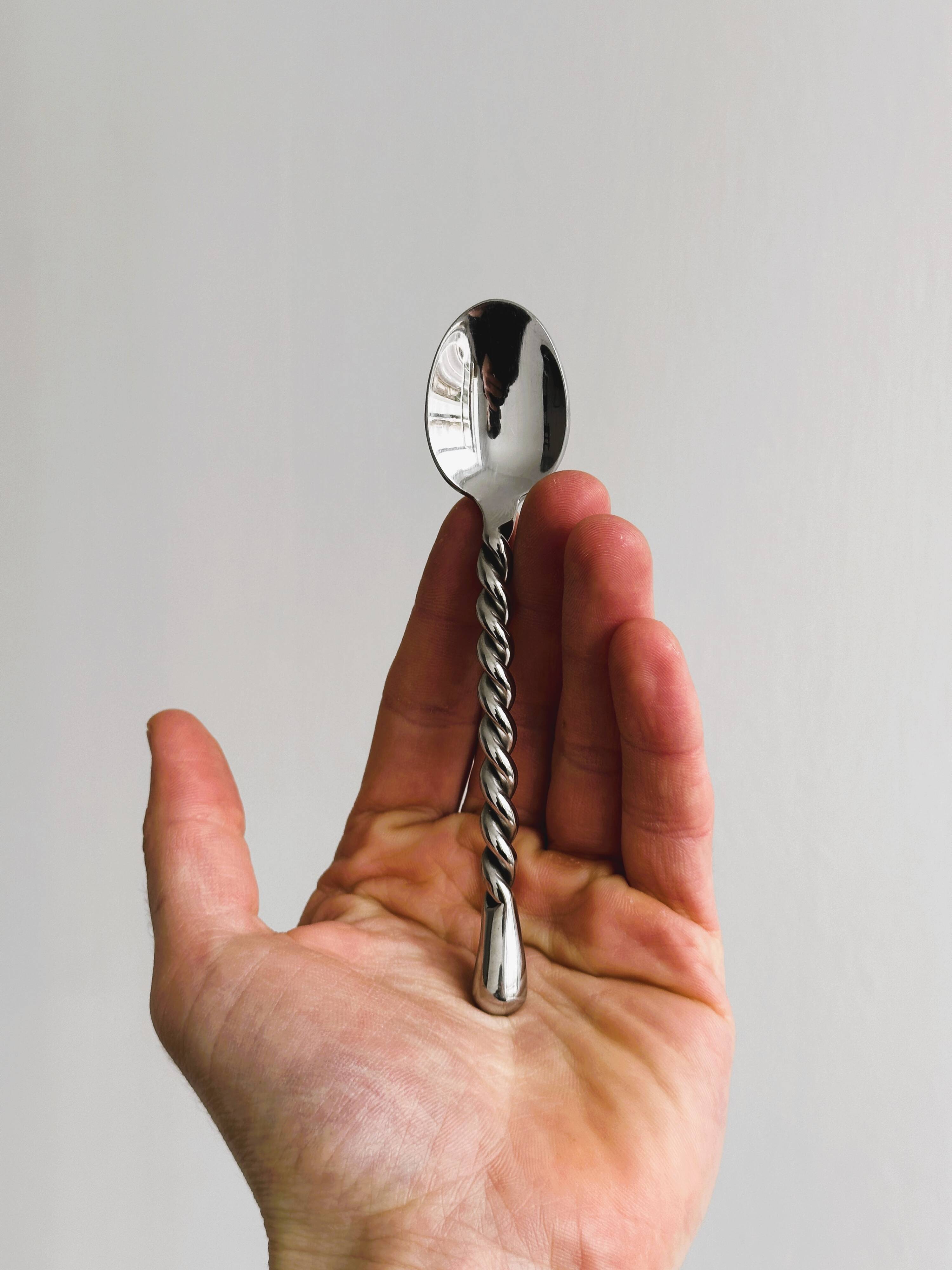 5 small twisted silver metal teaspoons