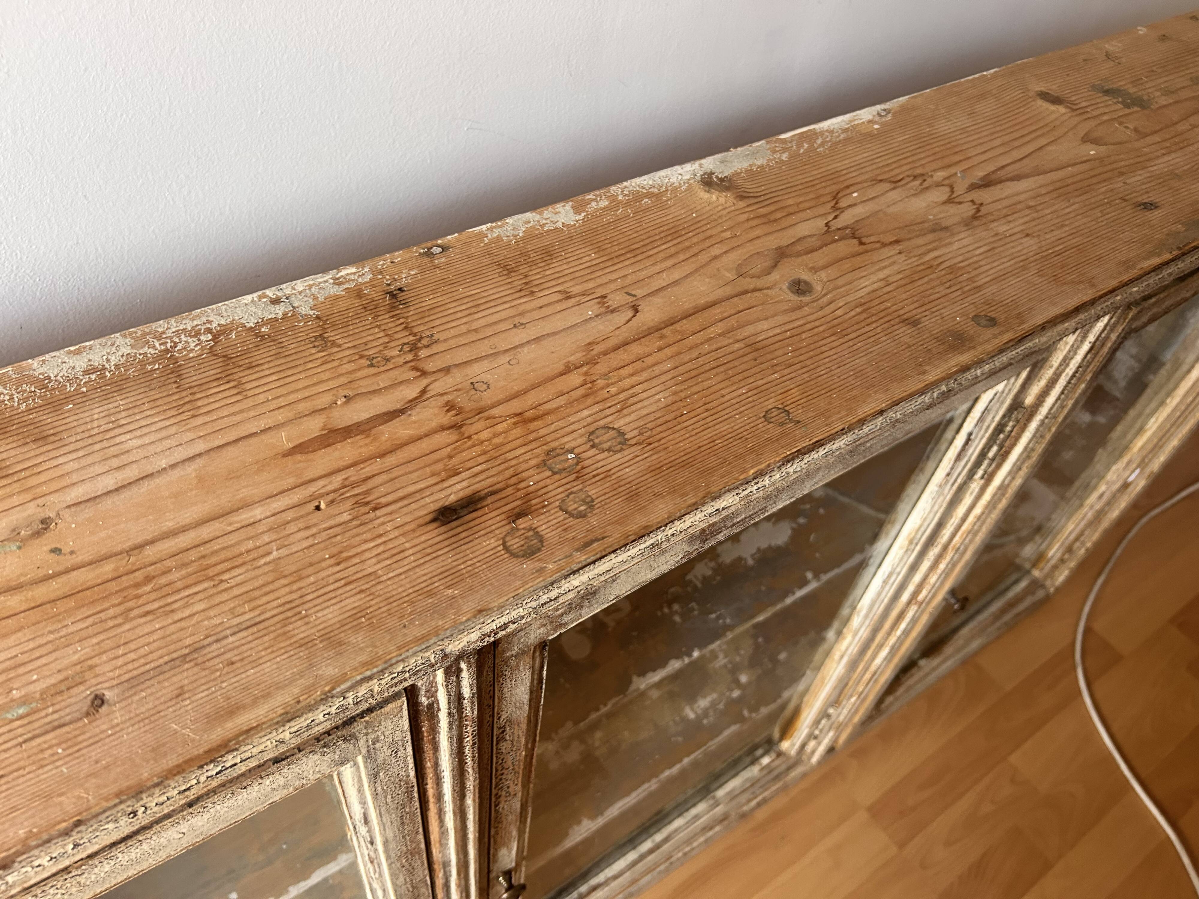 Old wooden shop display case to hang from the early 20th century.