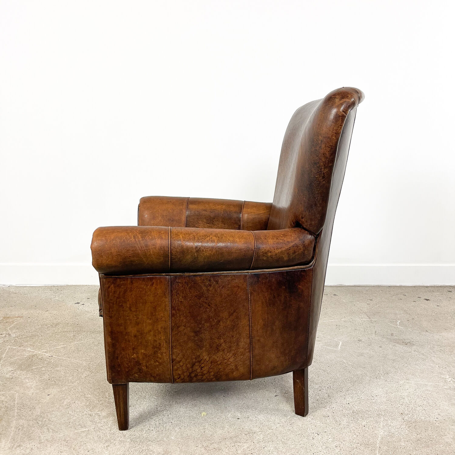 Vintage dark sheep leather club chair Achterdijk