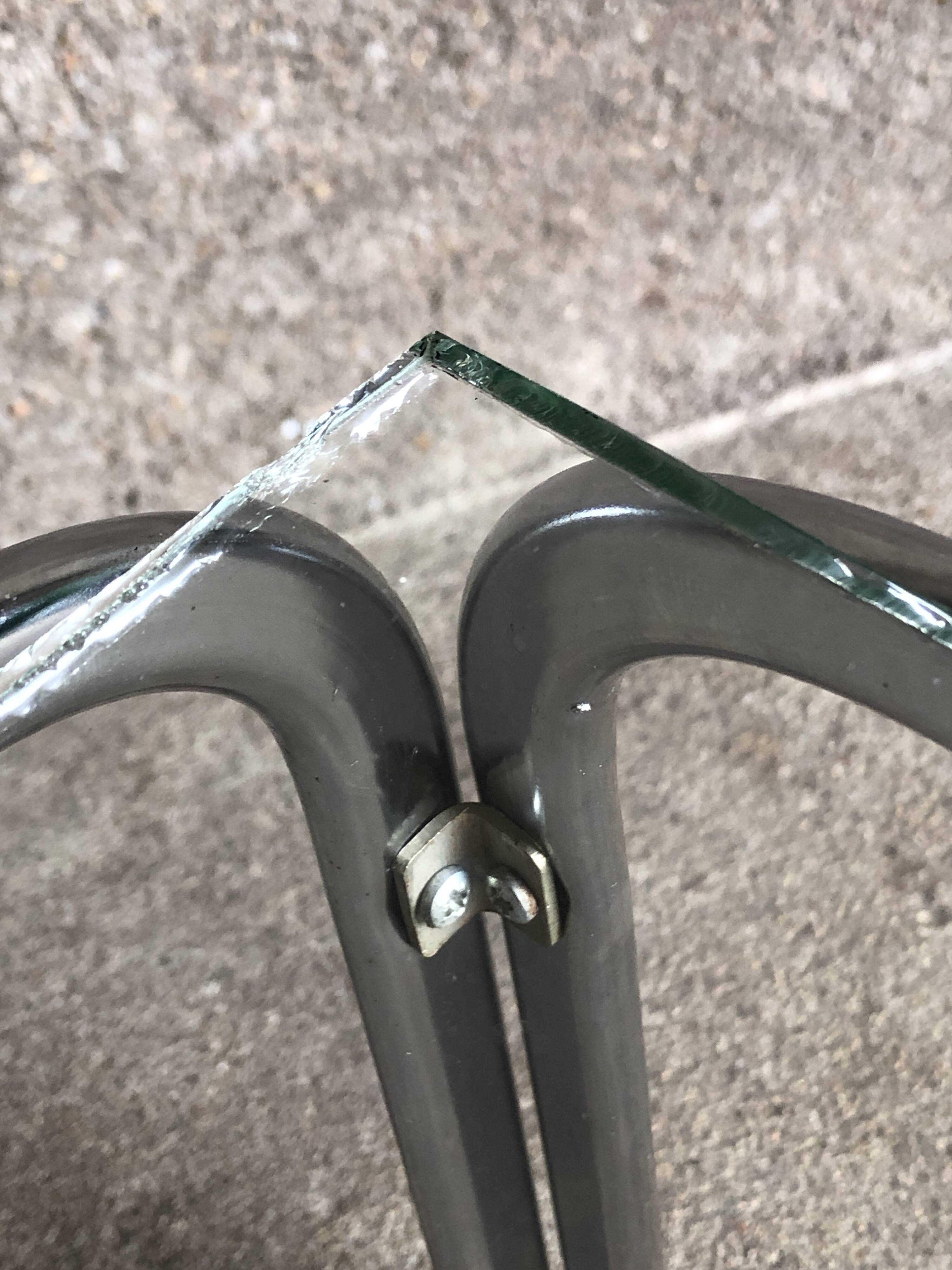 Coffee table with chrome legs and glass top, 1970