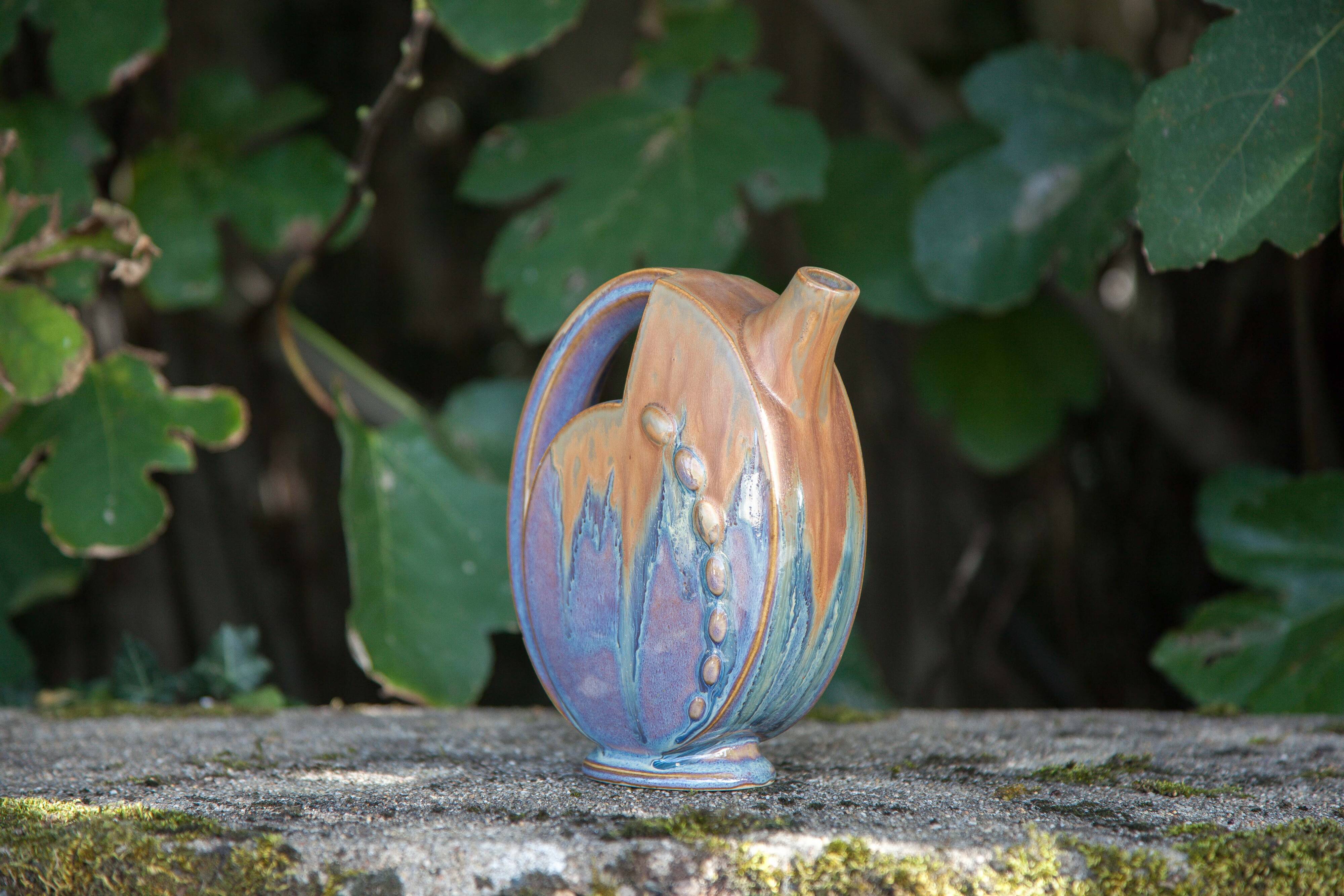 Flamed enameled stoneware bottle, pitcher, liquor bottle signed Denbac number 610, art vase