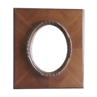 Wooden frame with oval opening