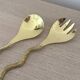 Gold metal snake salad serving set
