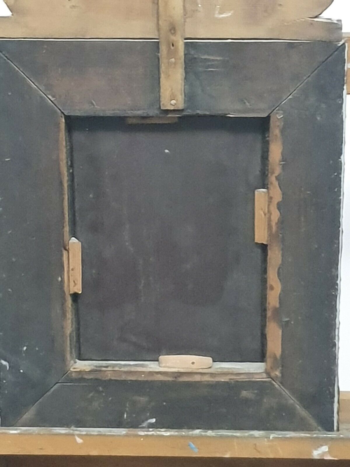 Old bevel mirror with metal parcloses pushed back Louis XIV style