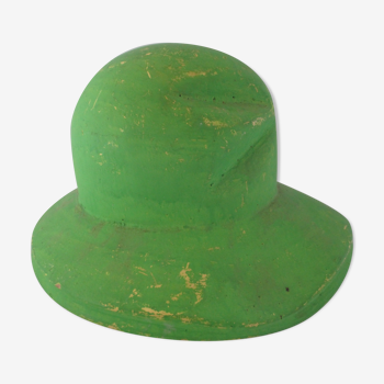 Pressed plaster hat mold with green textile fiber surface