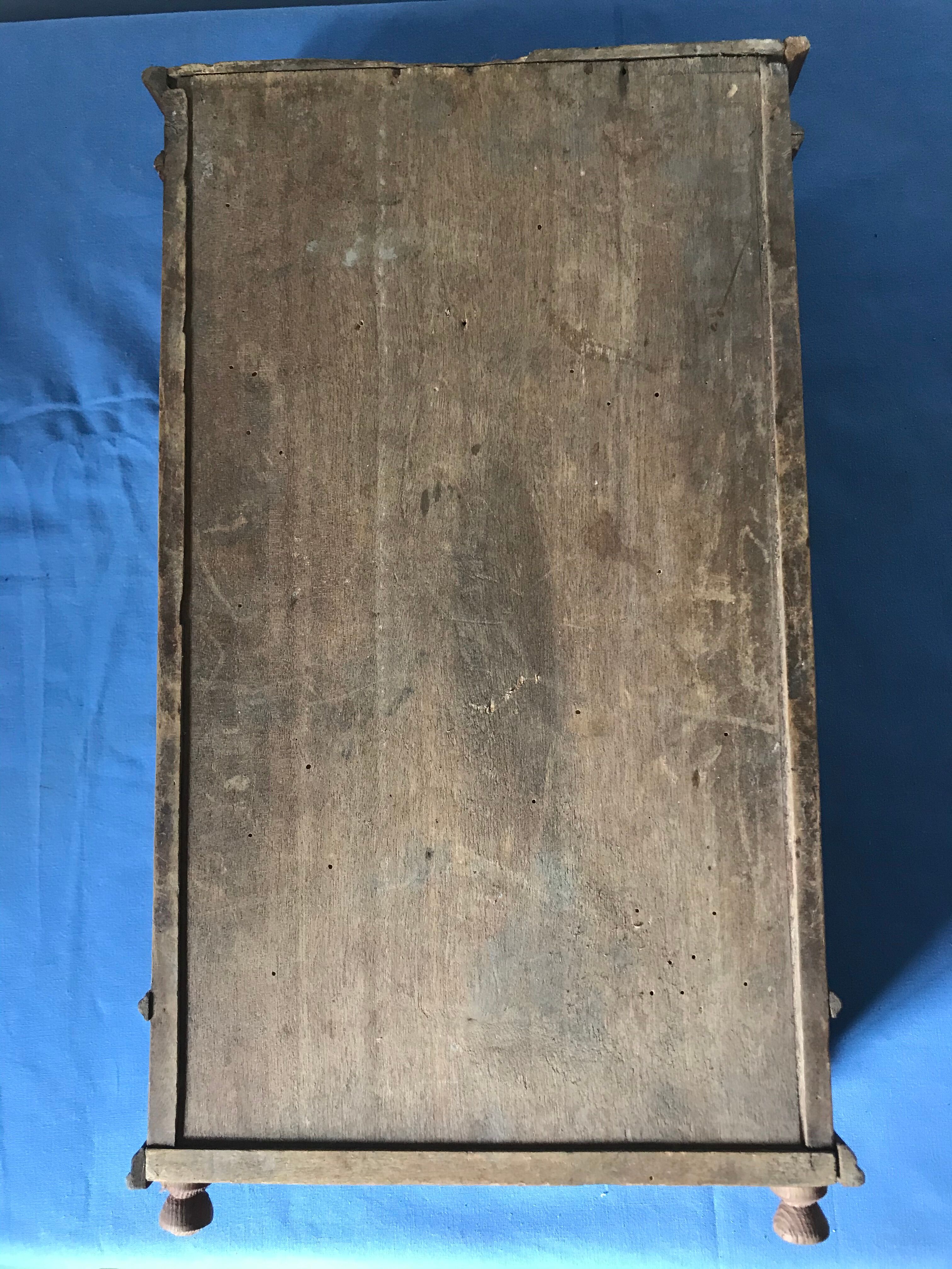 Ancient doll cabinet