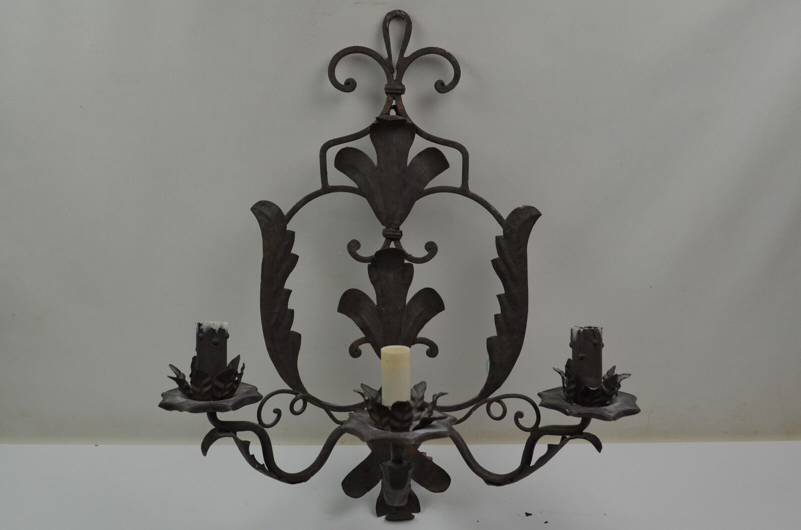 Pair of grey patinated iron wall lamps
