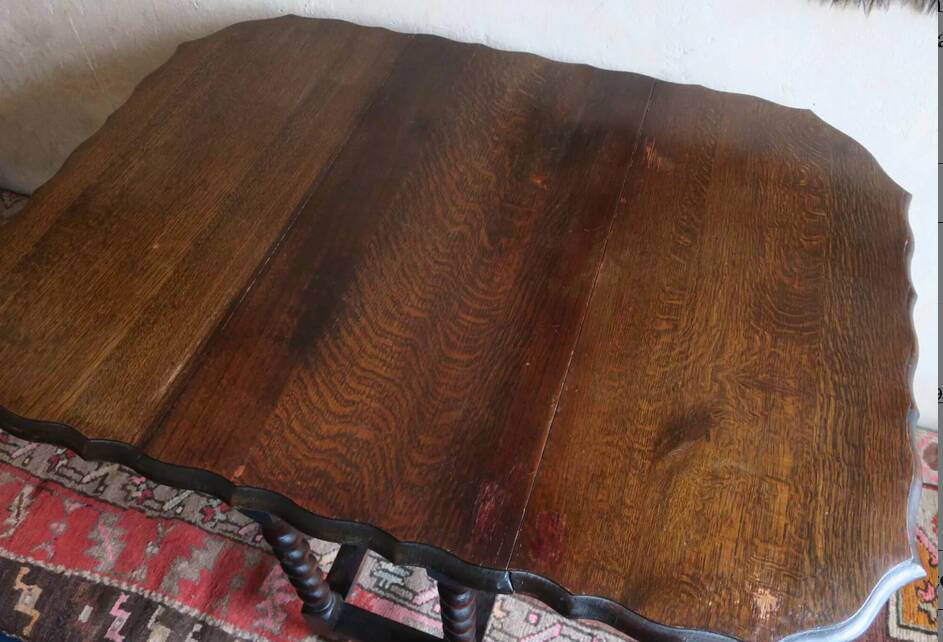 Antique farmhouse patinated extendable table in oak with carved edge, 1900