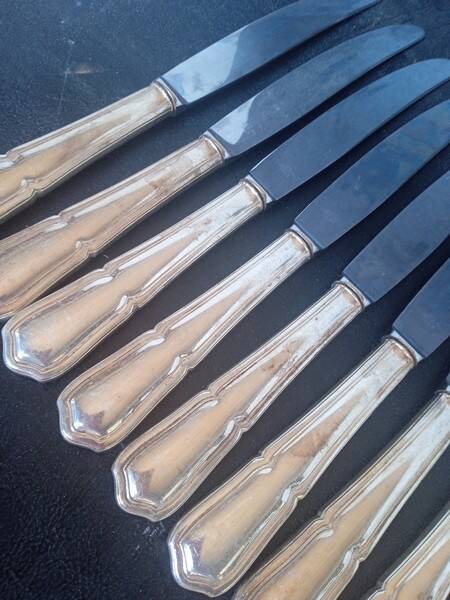 12 knives + silver metal punch from the 1950s